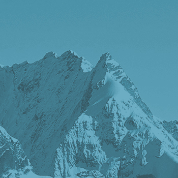 decorative blue-tinted mountain range
