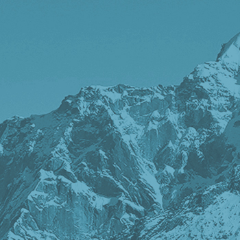 decorative blue-tinted mountain range